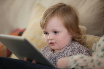 a baby using a tablet